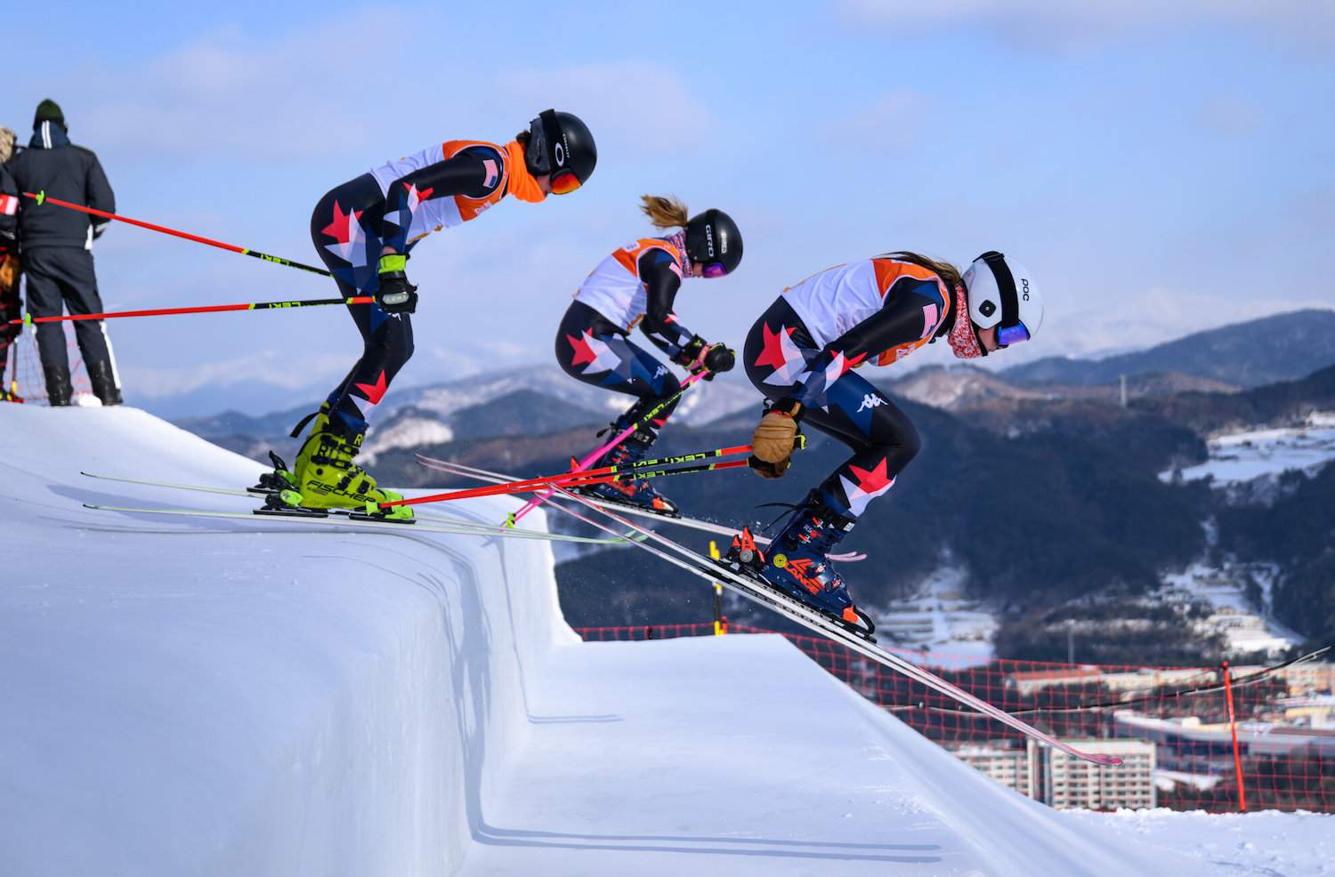 Swain in USA - a group of people riding ski boards down a slope.