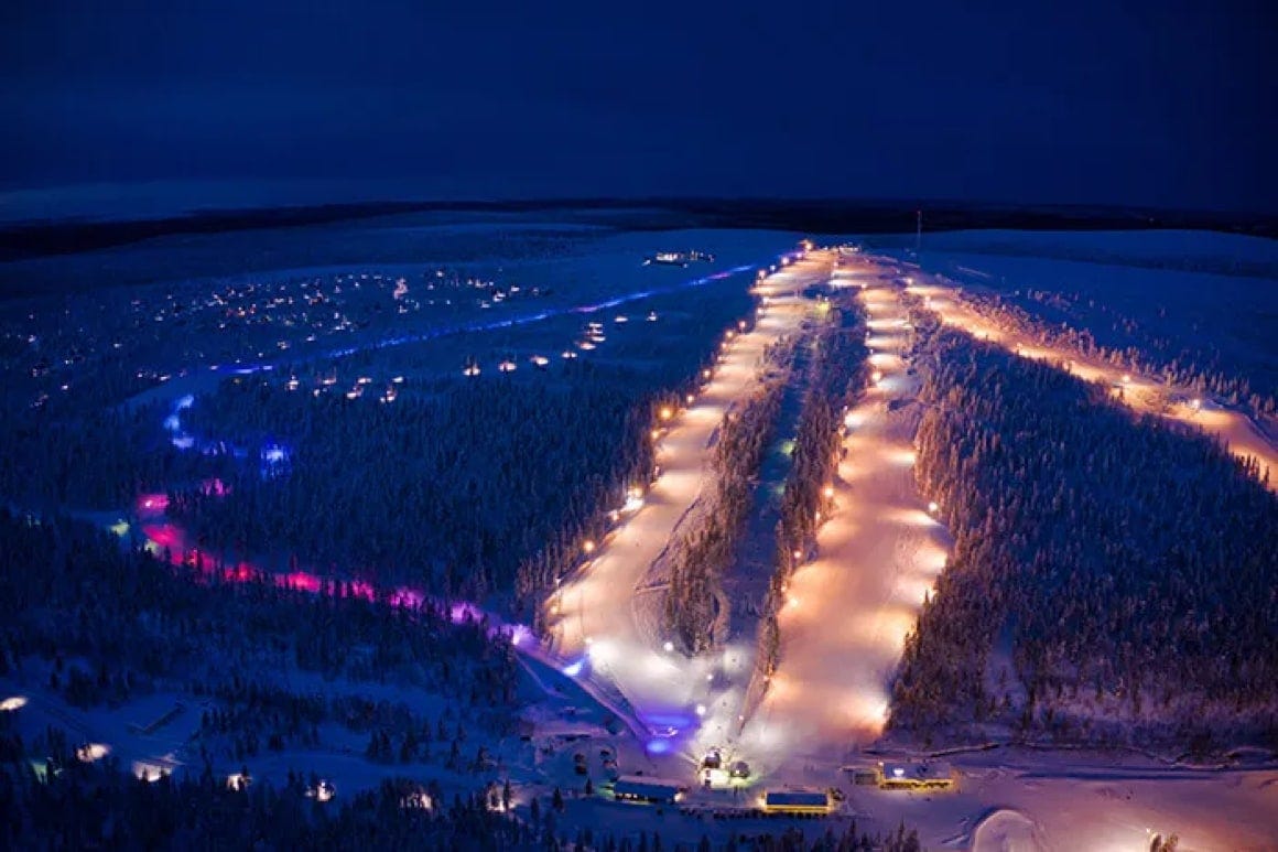 Saariselkä in Finland: an aerial view of a ski resort at night.