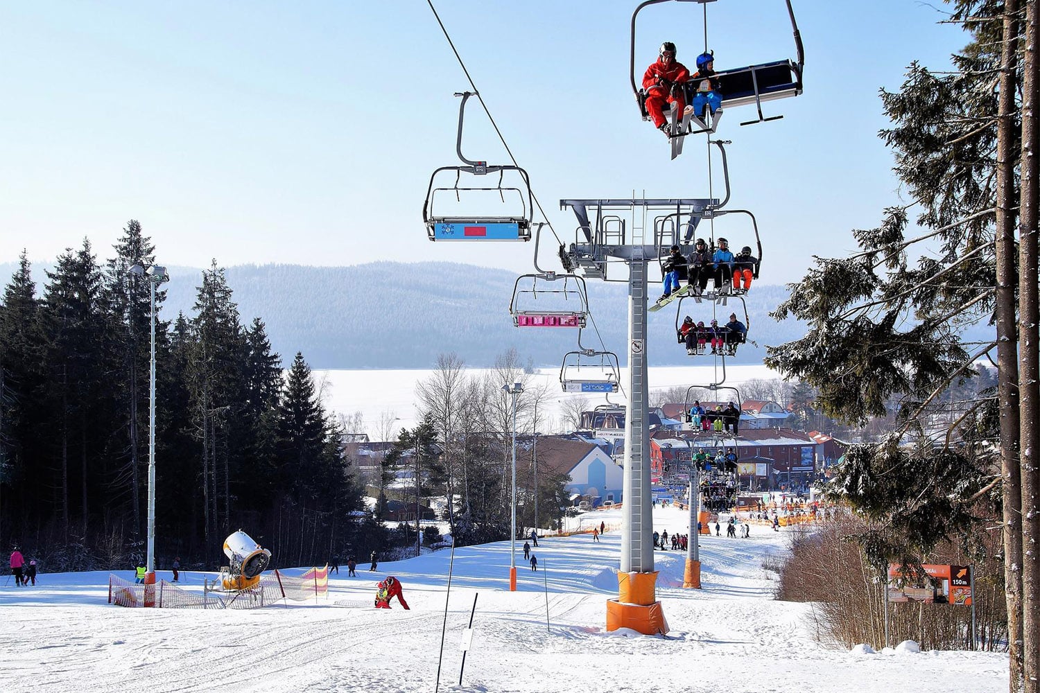 Pec pod Sněžkou in Czech Republic - a ski lift going up a snowy hill.