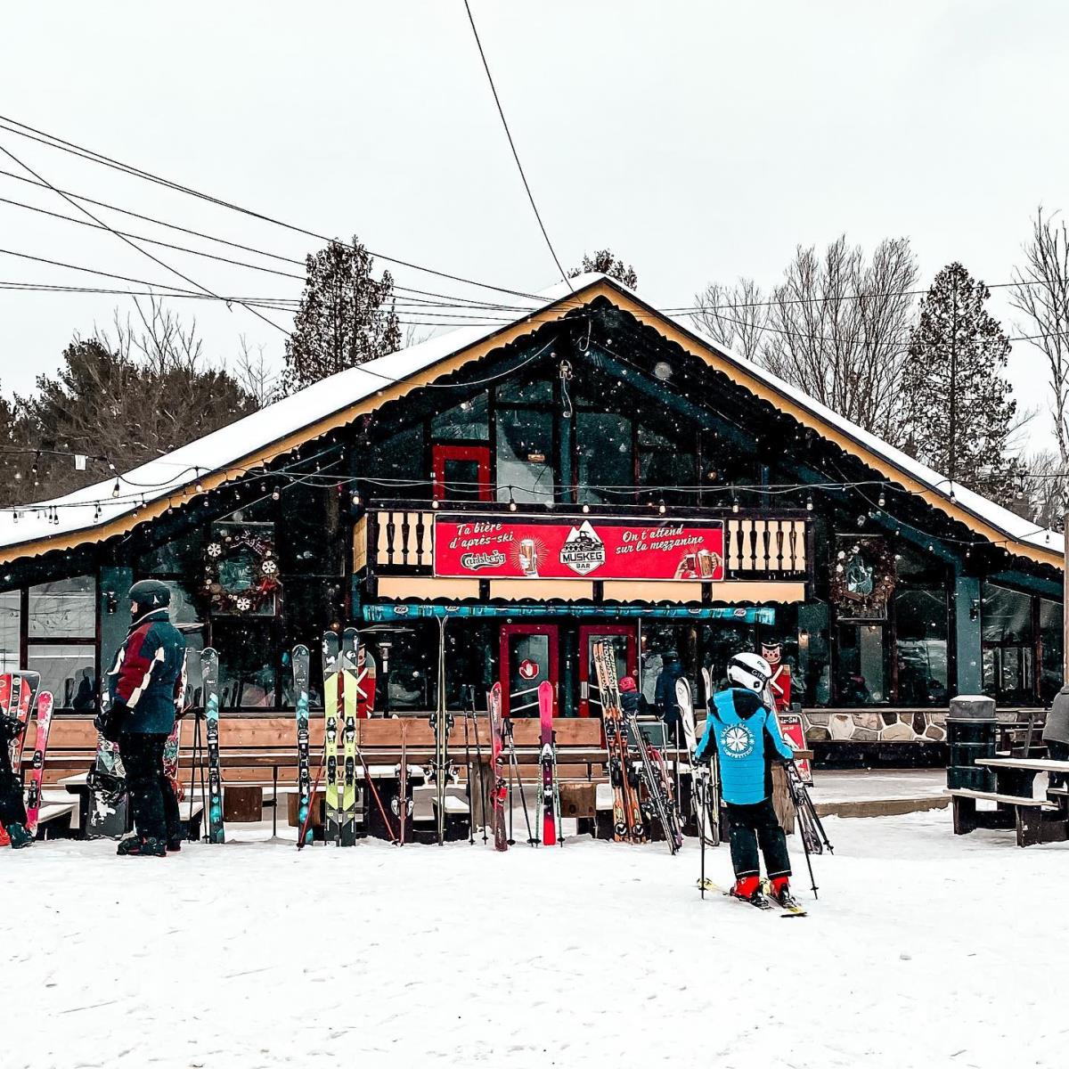 Vallée Bleue in Canada - a group of people that are standing in the snow.