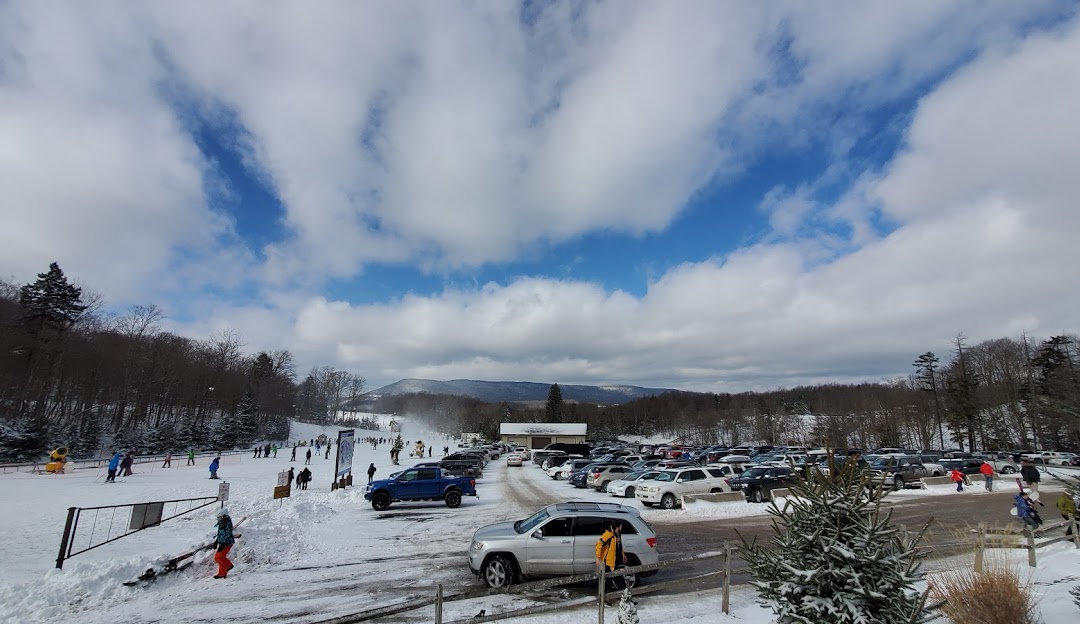 Canaan Valley ski resort in Davis, West Virginia, buzzing with winter sports activity amidst a picturesque winter landscape.
