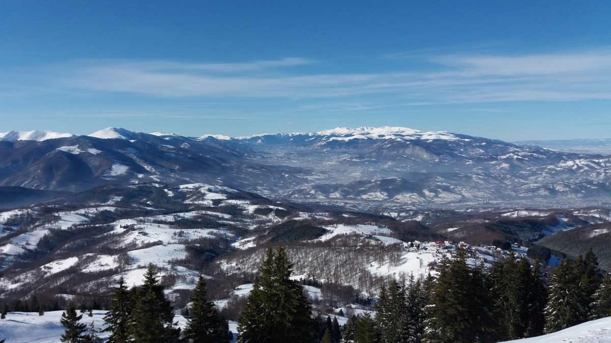 Parâng in Romania - a view of the mountains from the top of a mountain.