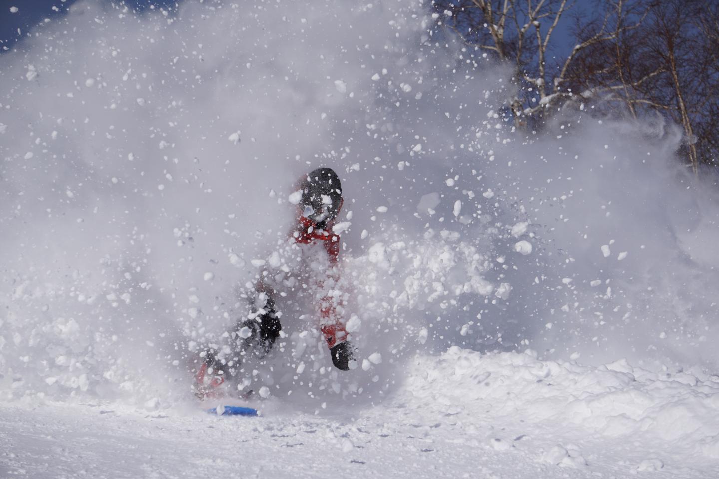 Nayoro Piyashiri in Japan - a person in the snow with a snow blower.