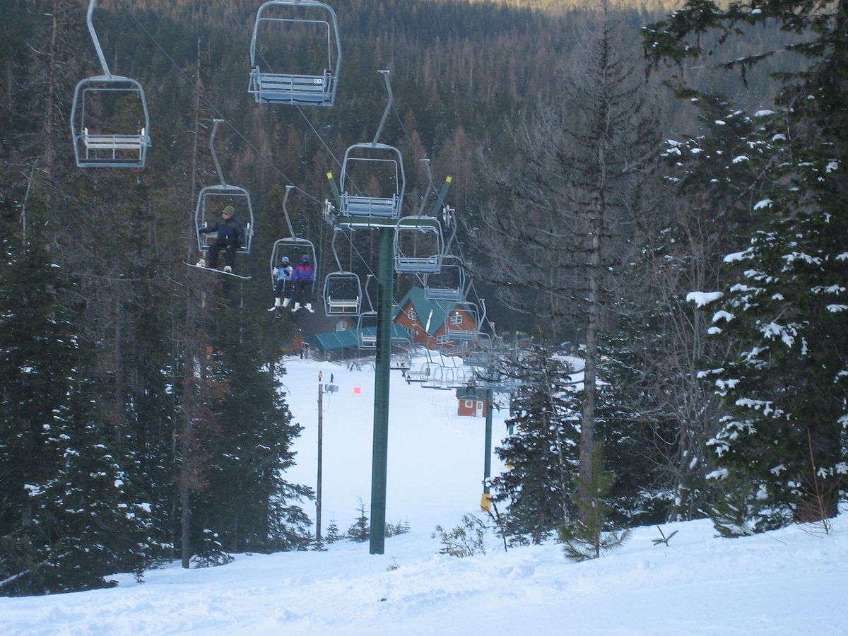 Cooper Spur in USA - a ski lift going up a snowy hill.