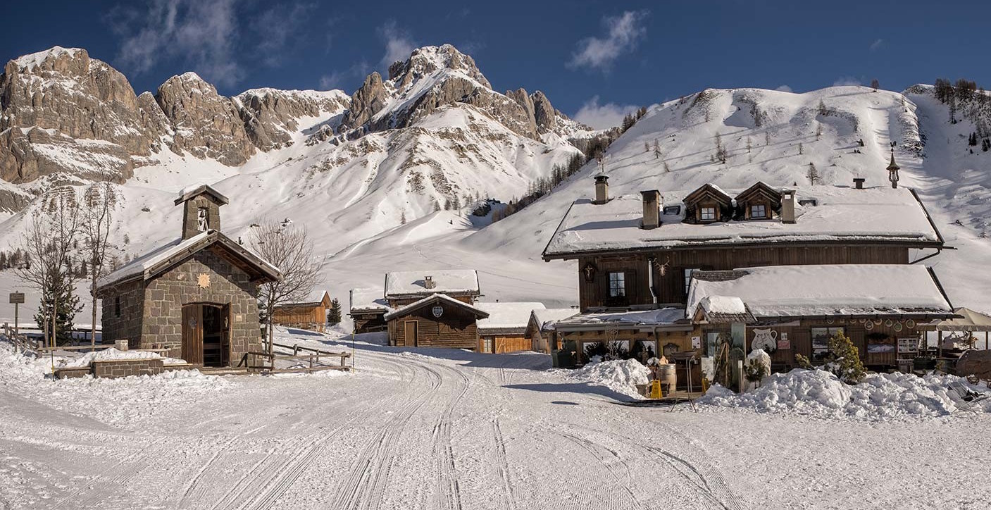 Passo San Pellegrino | ​Falcade in Italy - a snowy village in the italian alps.
