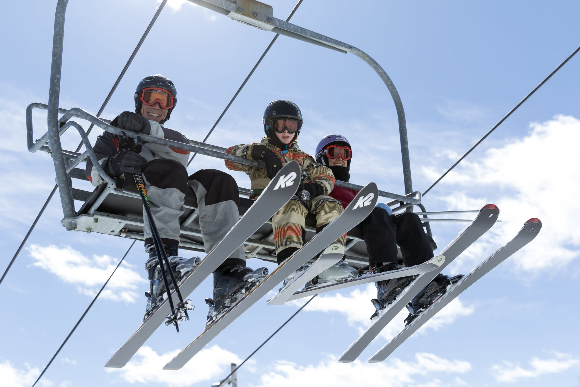 Oak Mountain in USA - a man and a woman riding a ski lift.