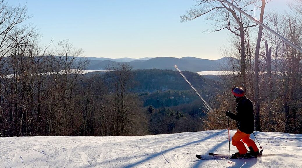 Oak Mountain in USA - a person riding skis down a snowy slope.