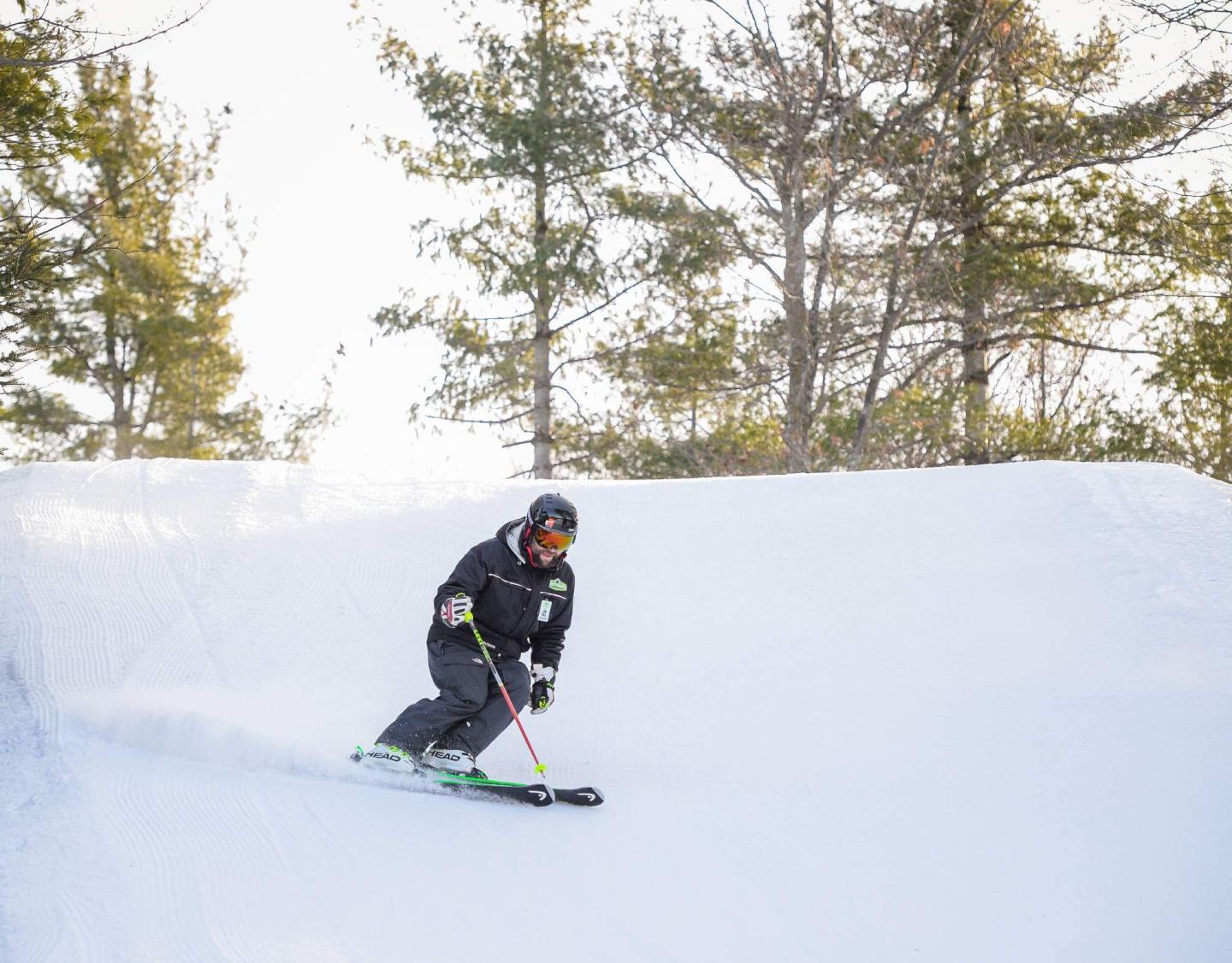Mont Rigaud in Canada - a person riding skis down a snowy slope.