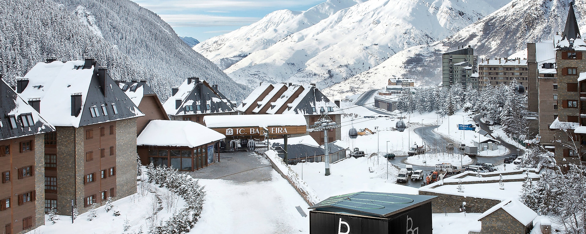 Baqueira Beret in Spain - a view of a town in the mountains covered in snow.