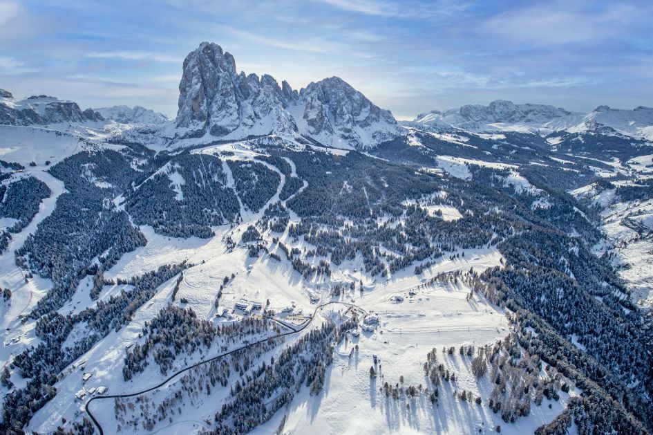 Val Gardena in Italy - aerial view of the doloma mountains in winter.