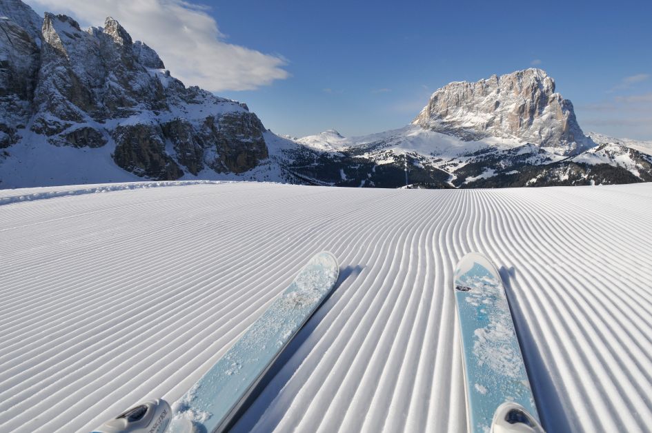 Val Gardena in Italy - a pair of skis sitting on top of a snow covered slope.
