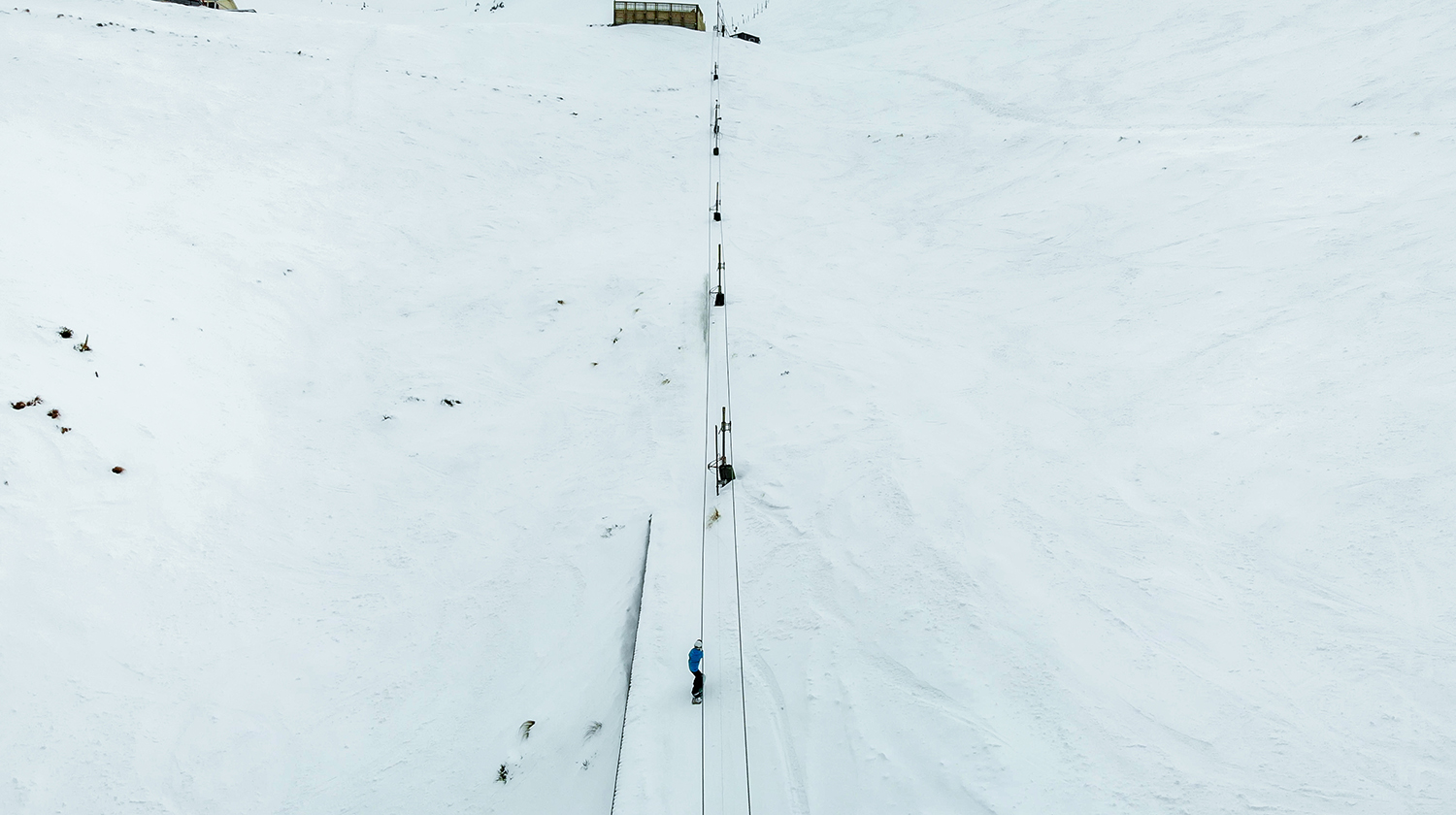 Hiraniwa Kogen in Japan - a group of people skiing down a mountain.