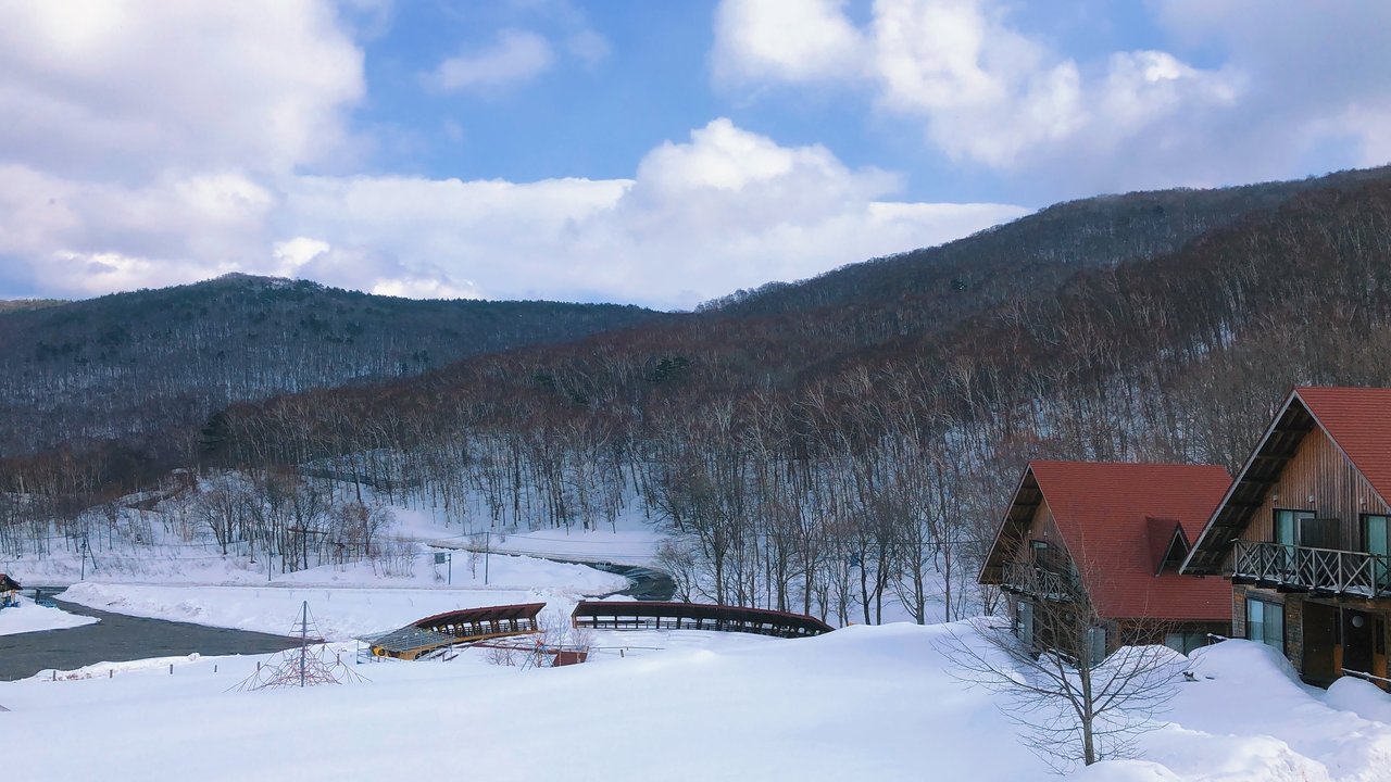 Hiraniwa Kogen in Japan - a house in the mountains covered in snow.
