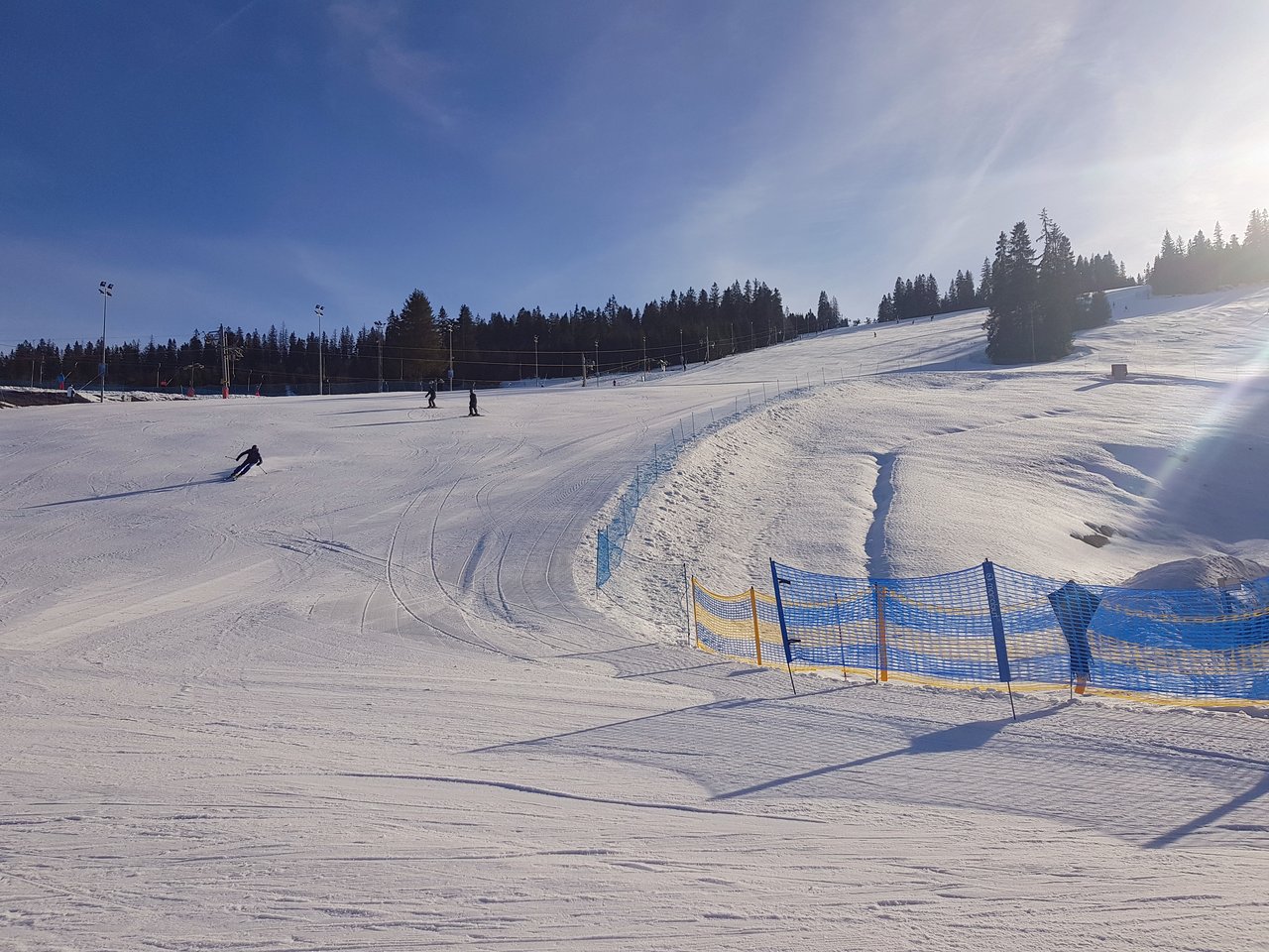 Hawrań – Jurgów in Poland - a person skiing down a snow covered hill.