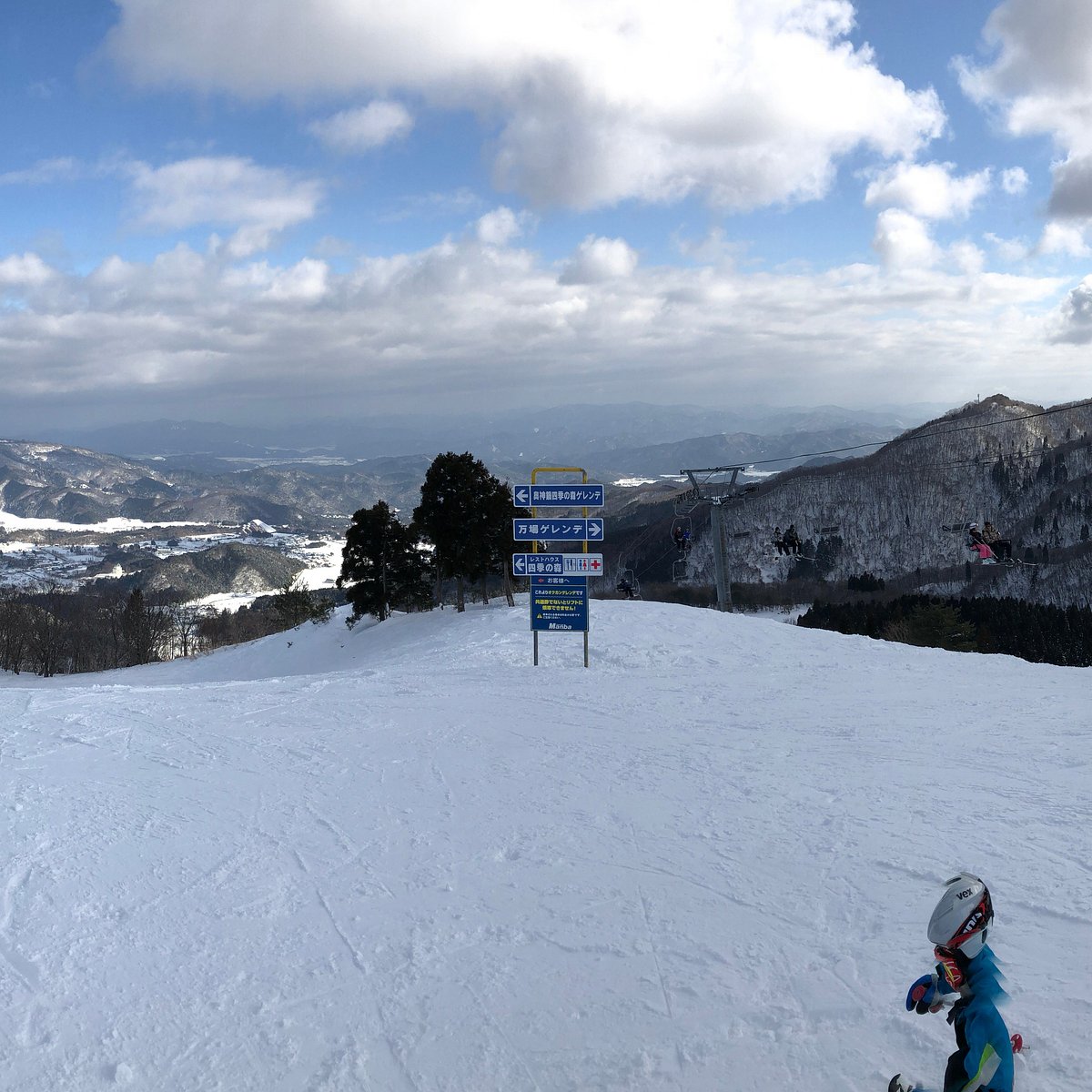 Manba in Japan - a person on a snowboard in the snow.
