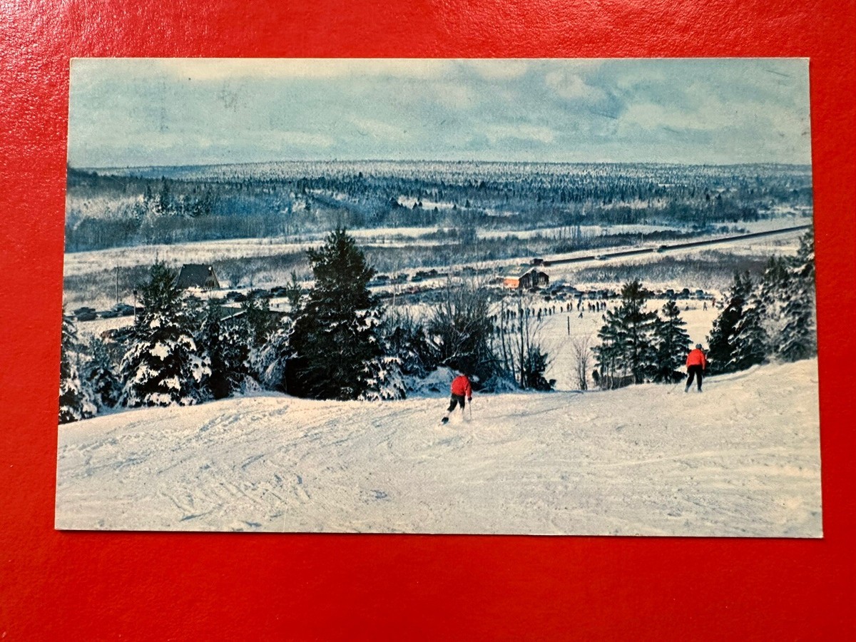 Wentworth in Canada - an old photo of a person skiing down a hill.