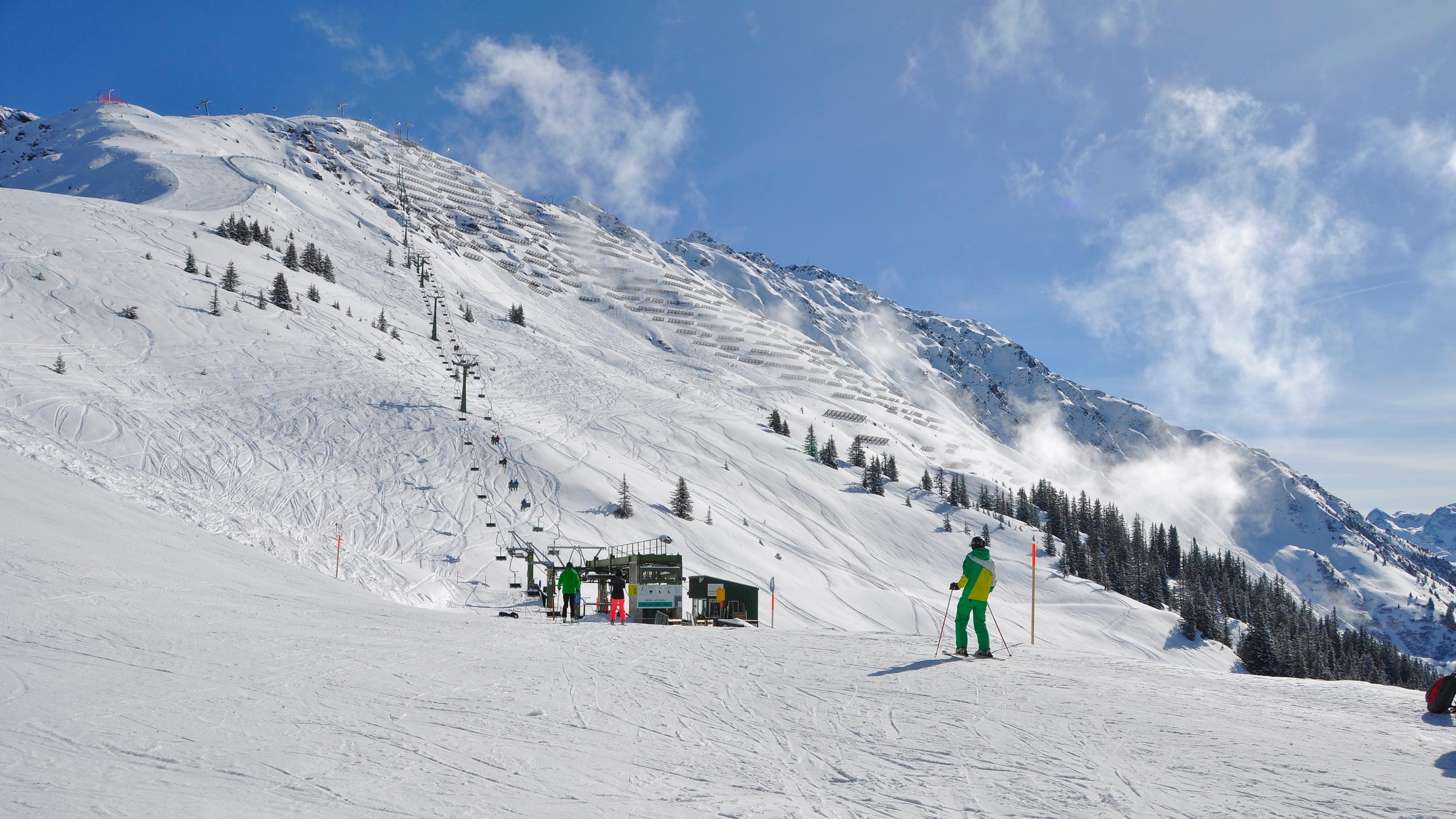 Wentworth in Canada - a group of people skiing down a snowy hill.
