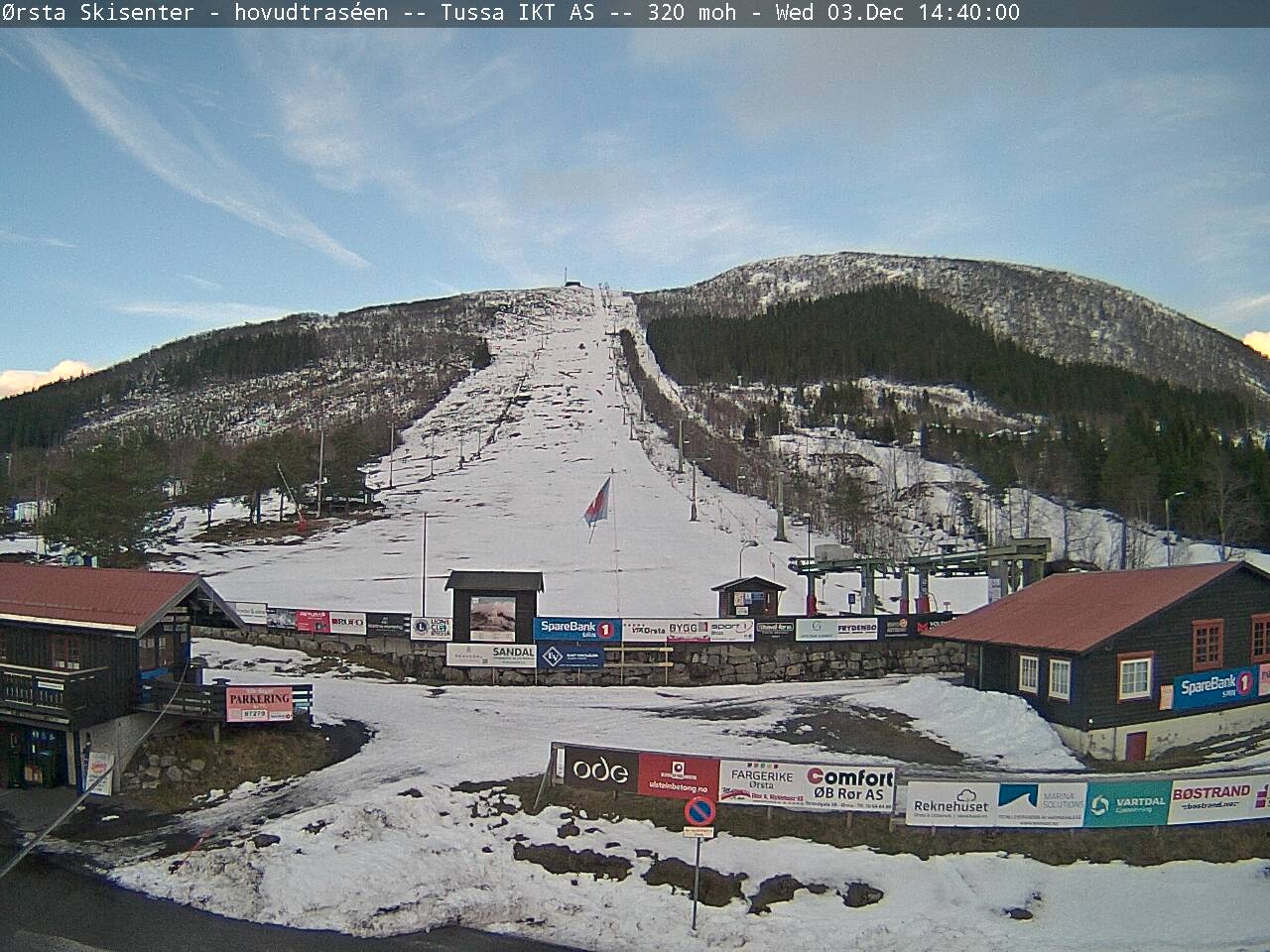 Ørsta Skisenter in Norway - a view of a small town with a mountain in the background.