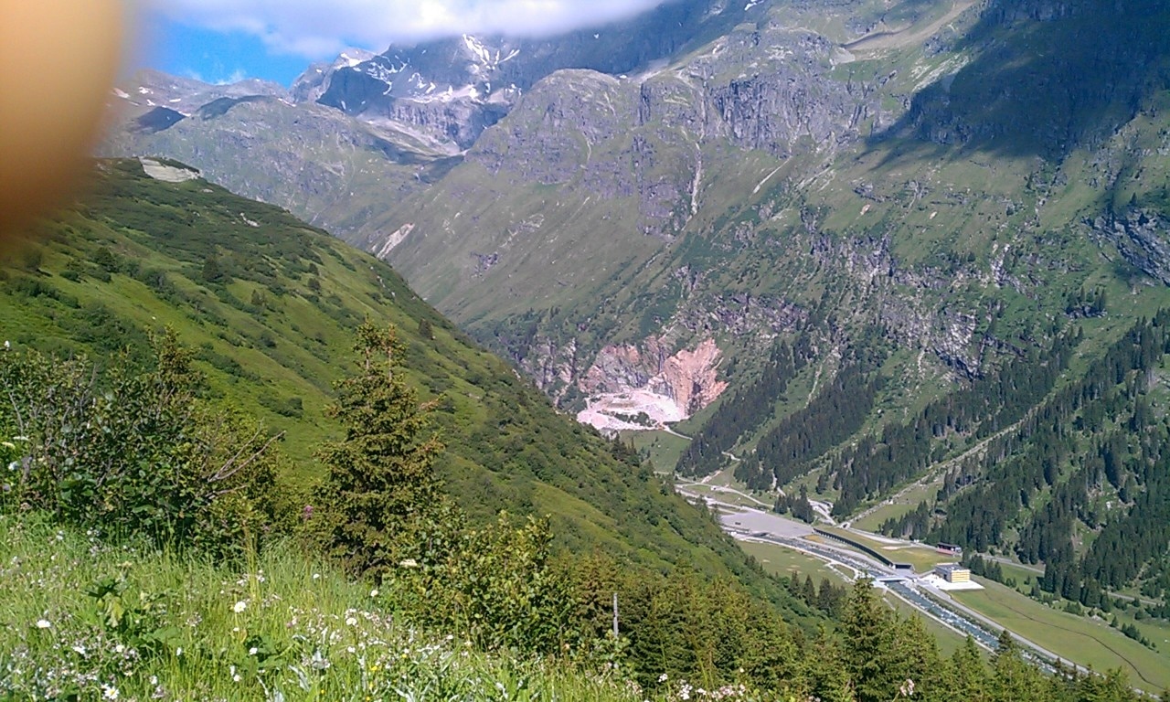 Tschappina-Lüsch-Urmein in Switzerland - a view of a valley with mountains in the background.