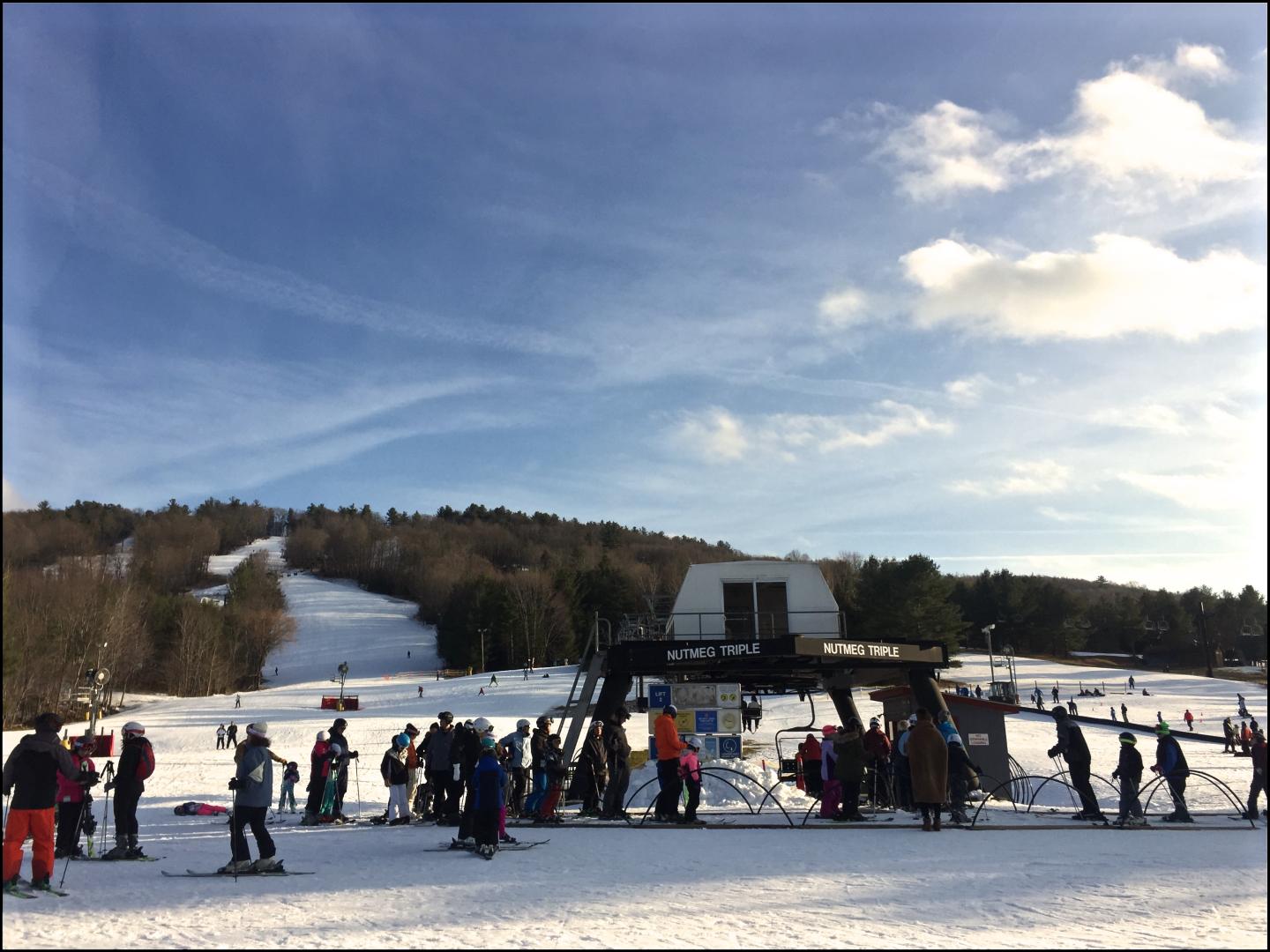 Mohawk Mountain in USA - a group of people standing in the snow.