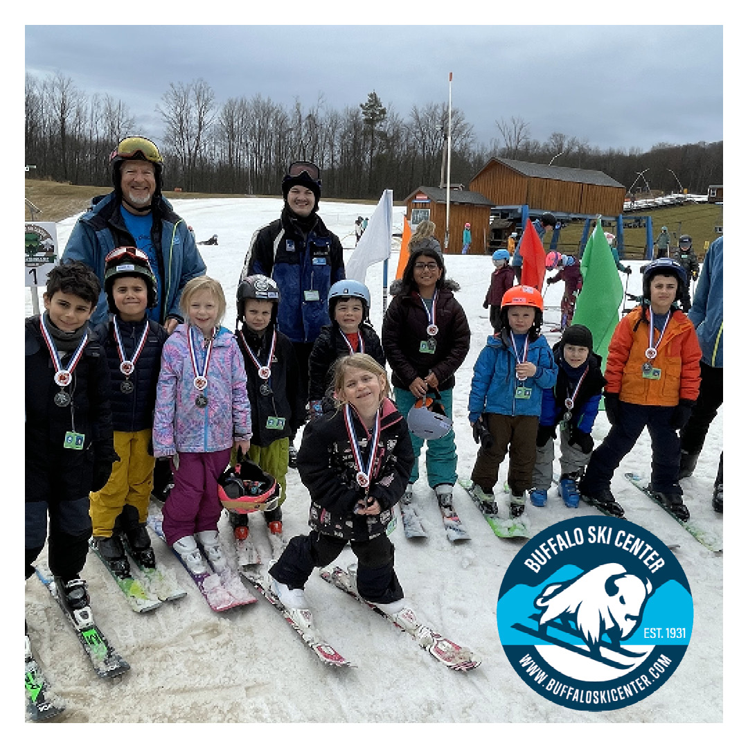 Buffalo in USA - a group of kids posing for a picture in the snow.
