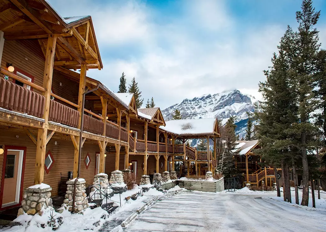 Buffalo in USA: a wooden building with snow on the ground.