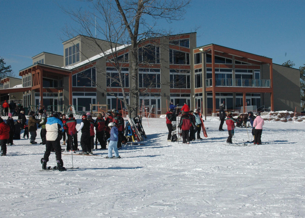 Big Bear at Masthope Mountain in USA - a group of people standing in the snow.