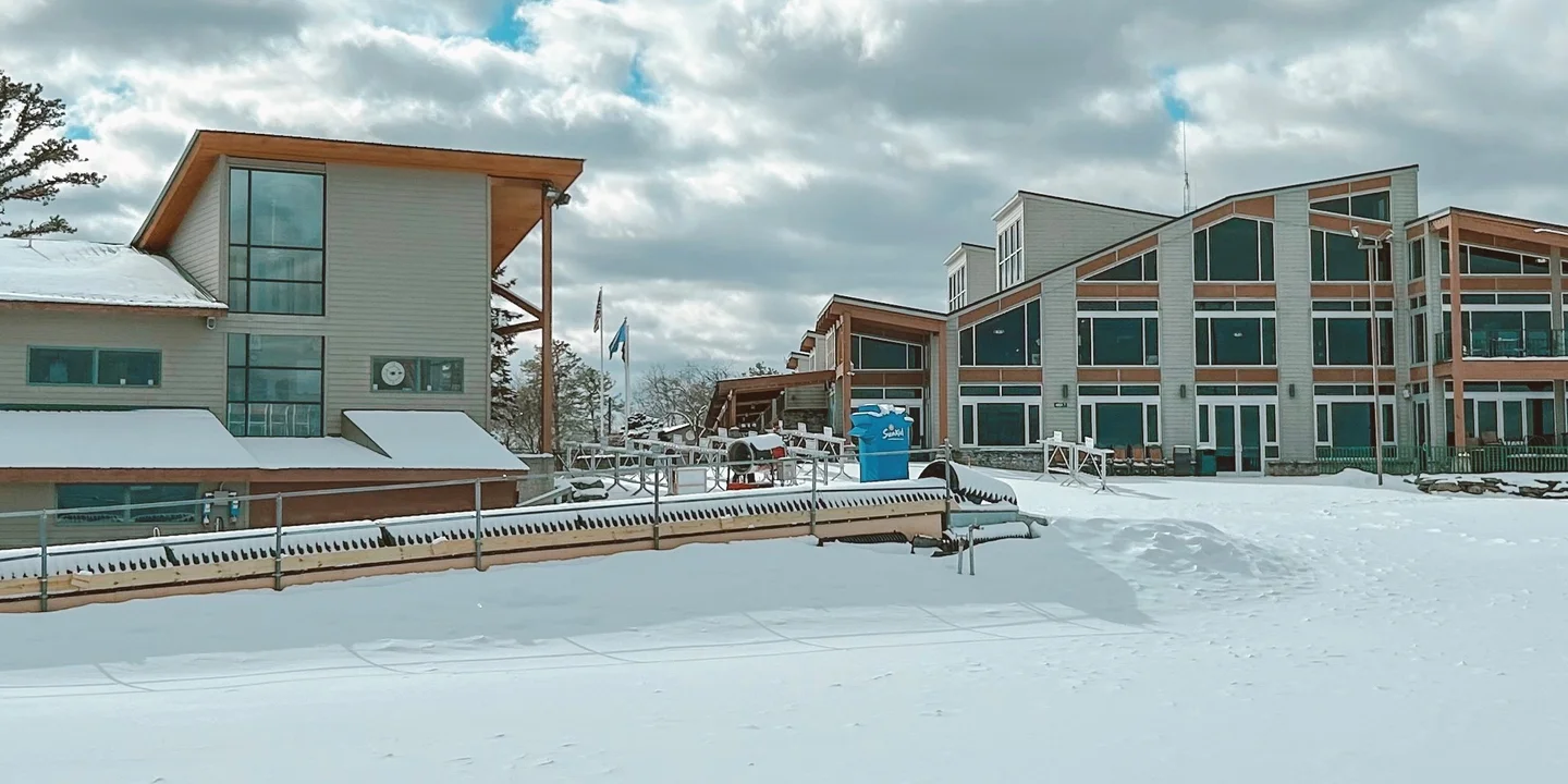 Big Bear at Masthope Mountain in USA - a row of houses with snow on the ground.