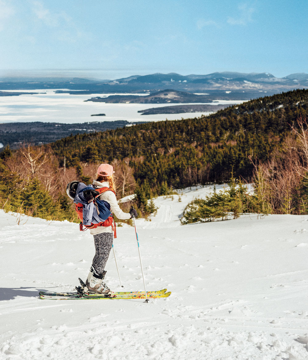 Big Moose Mountain in USA - a person on skis in the snow.
