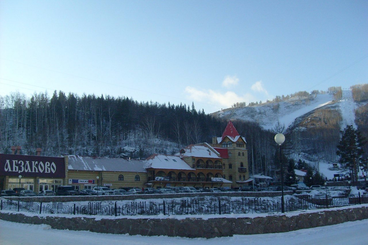 Abzakovo in Russia - a small town with a mountain in the background.
