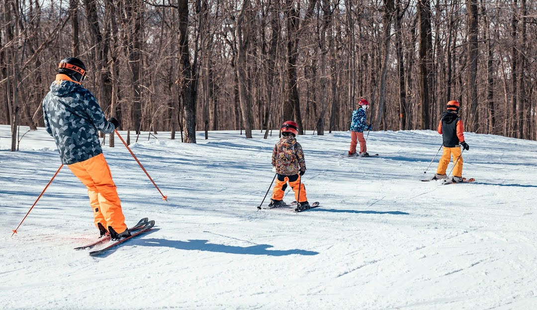 Ski Saint-Bruno in Canada - a group of people skiing down a hill.