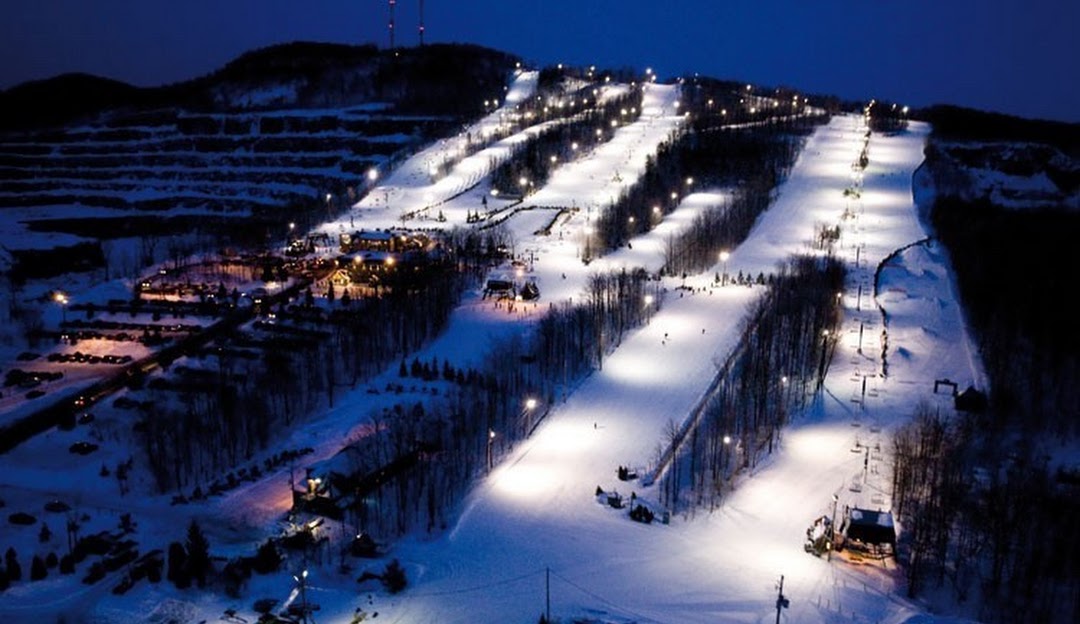 Ski Saint-Bruno in Canada - a ski slope lit up at night.