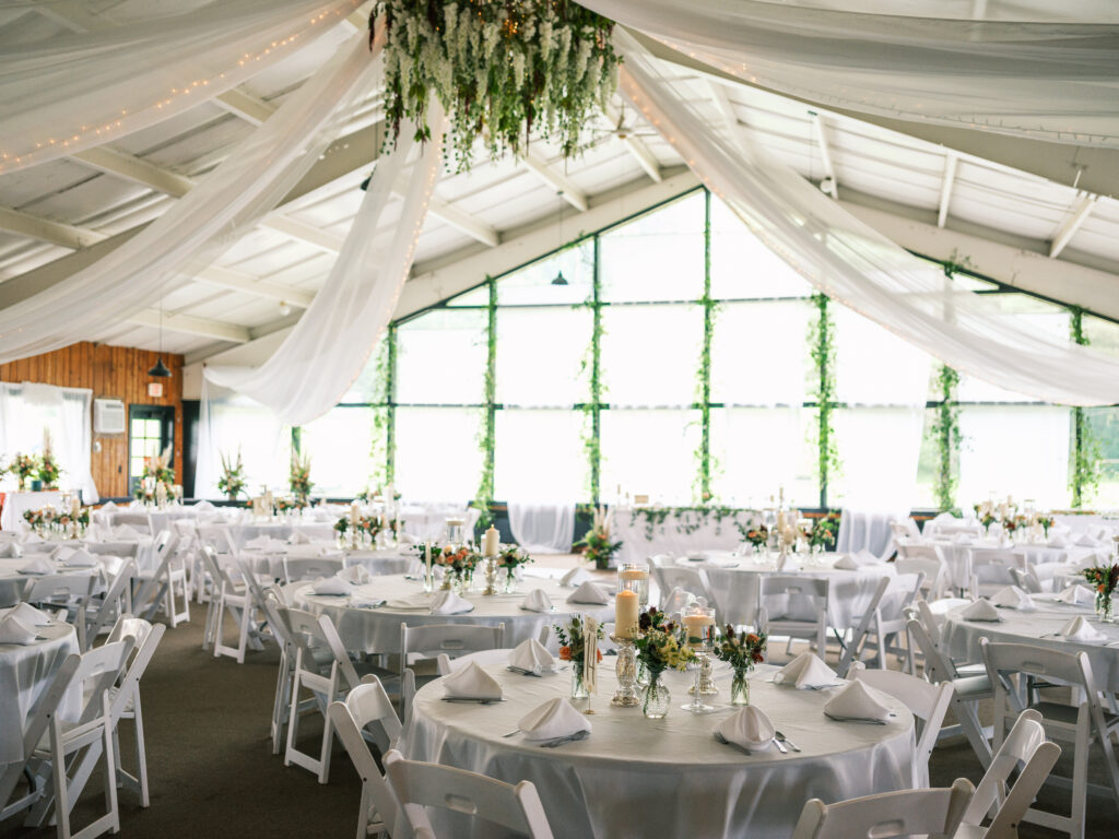 Snow Ridge in USA - a wedding reception with white tables and chairs.