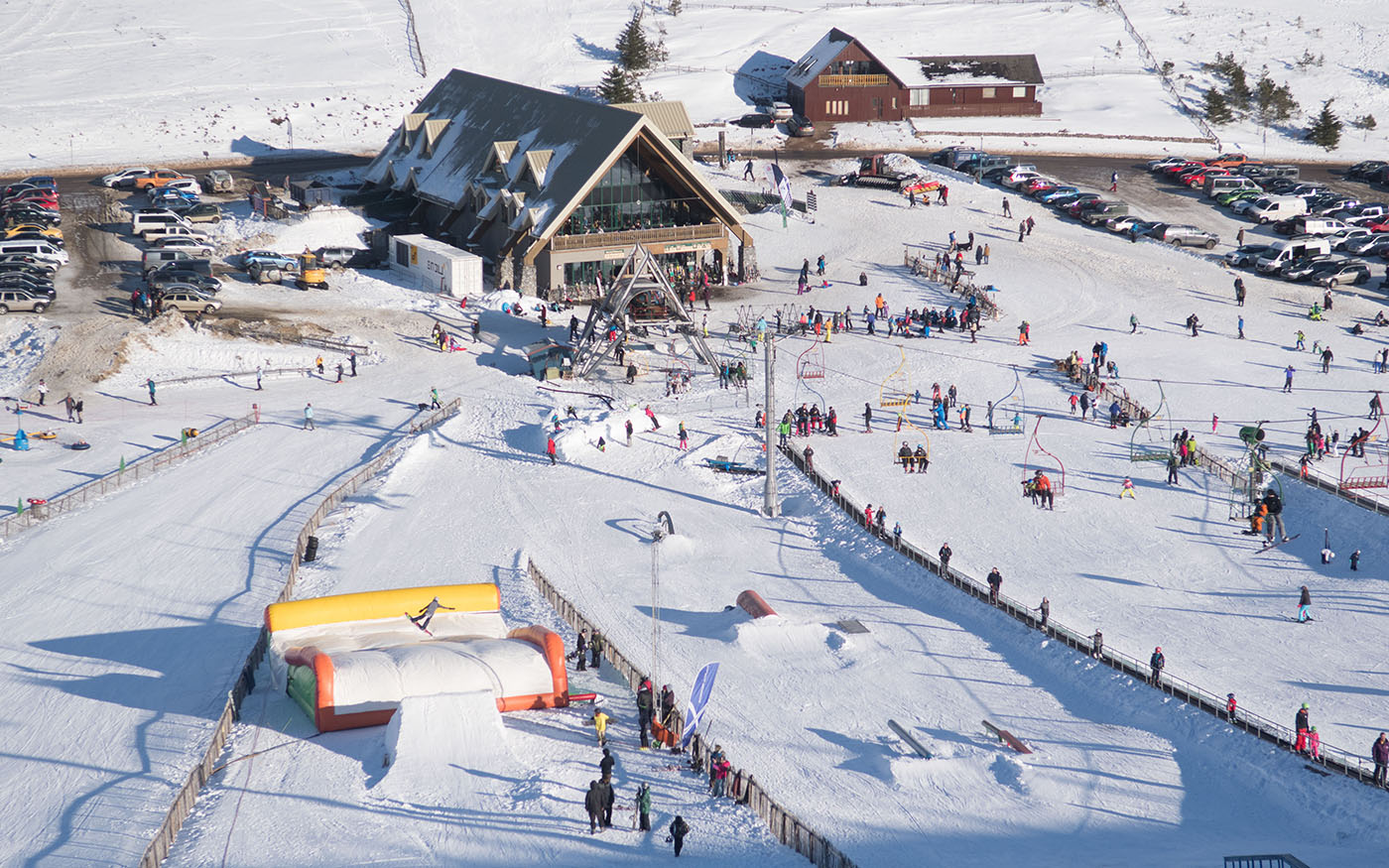 Lecht Ski Centre in United Kingdom - a large group of people skiing down a hill.