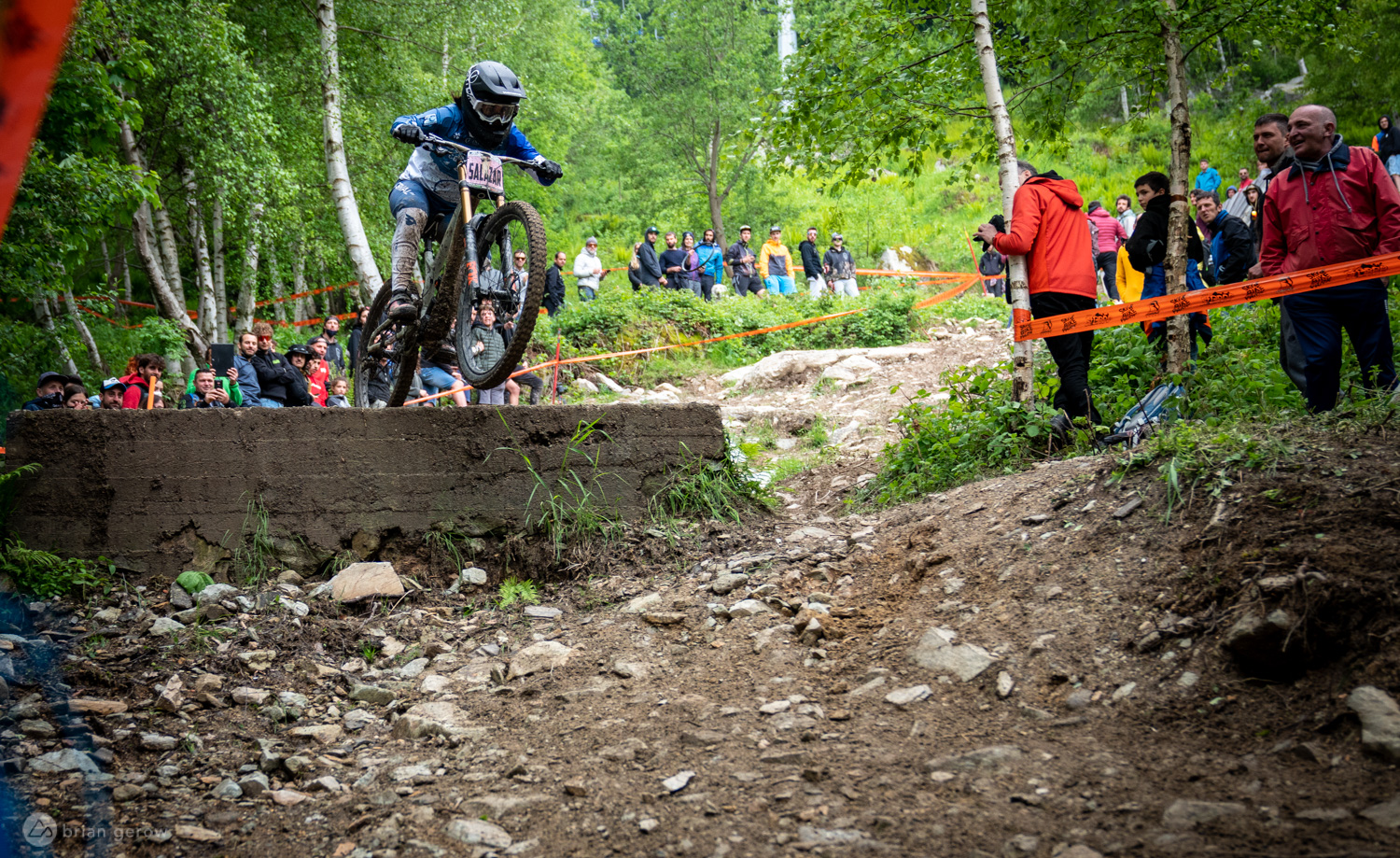 St.Gréé in Italy - a man riding a dirt bike on a trail.