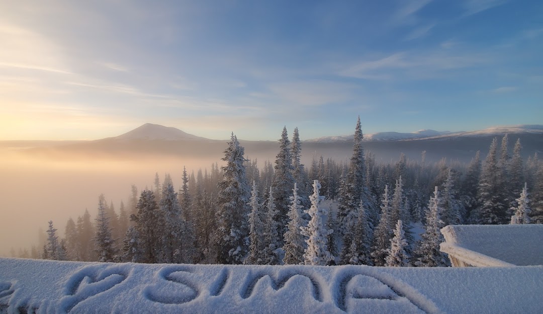 A captivating winter scene at Mount Sima in Whitehorse Yukon Canada showcasing a winter sports scene amidst the pristine snow-clad mountain at a ski resort.