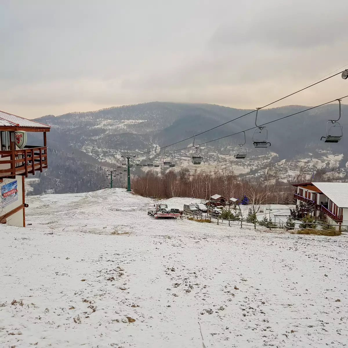 Krasiya in Ukraine - a ski lift going up a snowy hill.