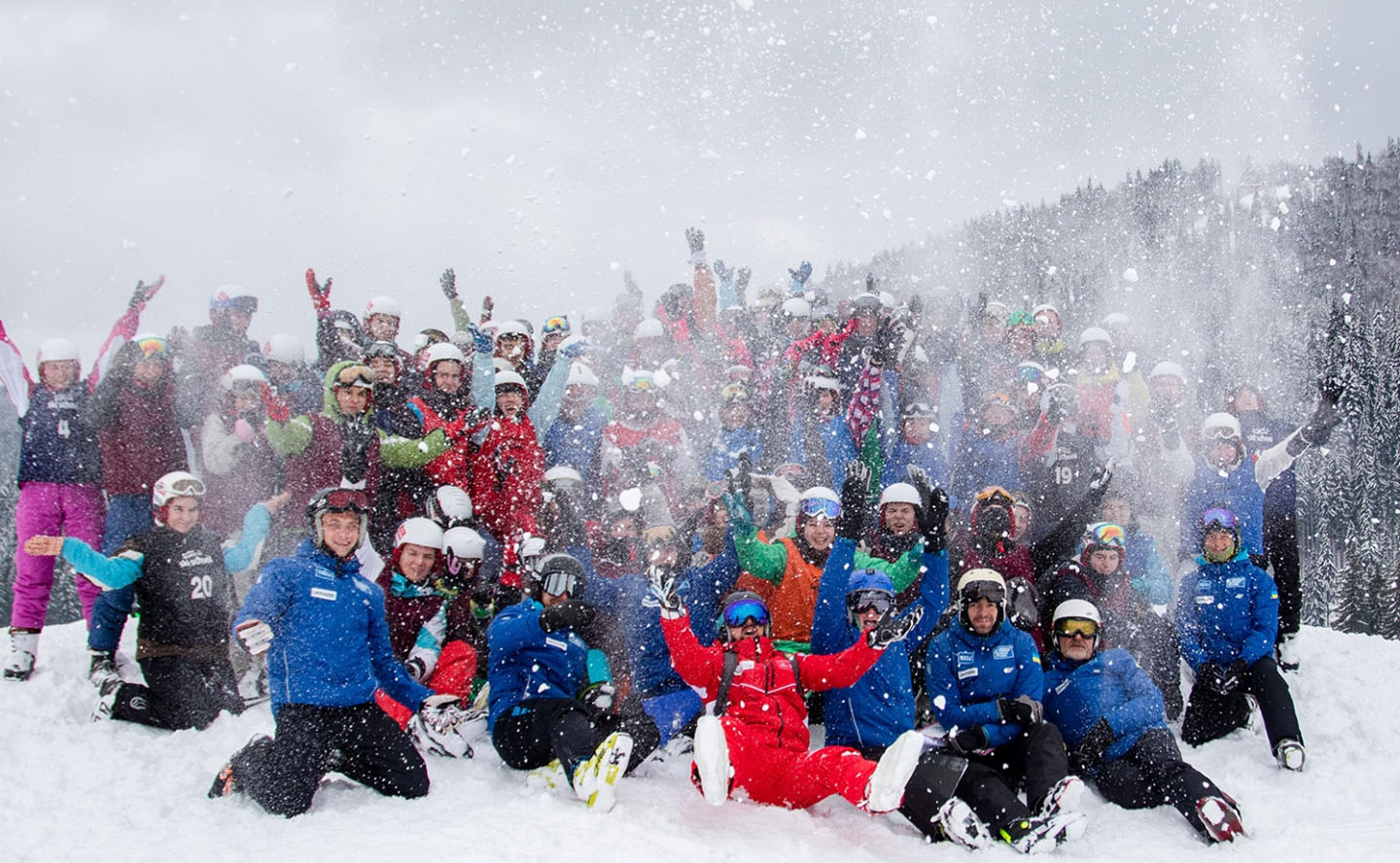 Krasiya in Ukraine - a group of people posing for a photo in the snow.