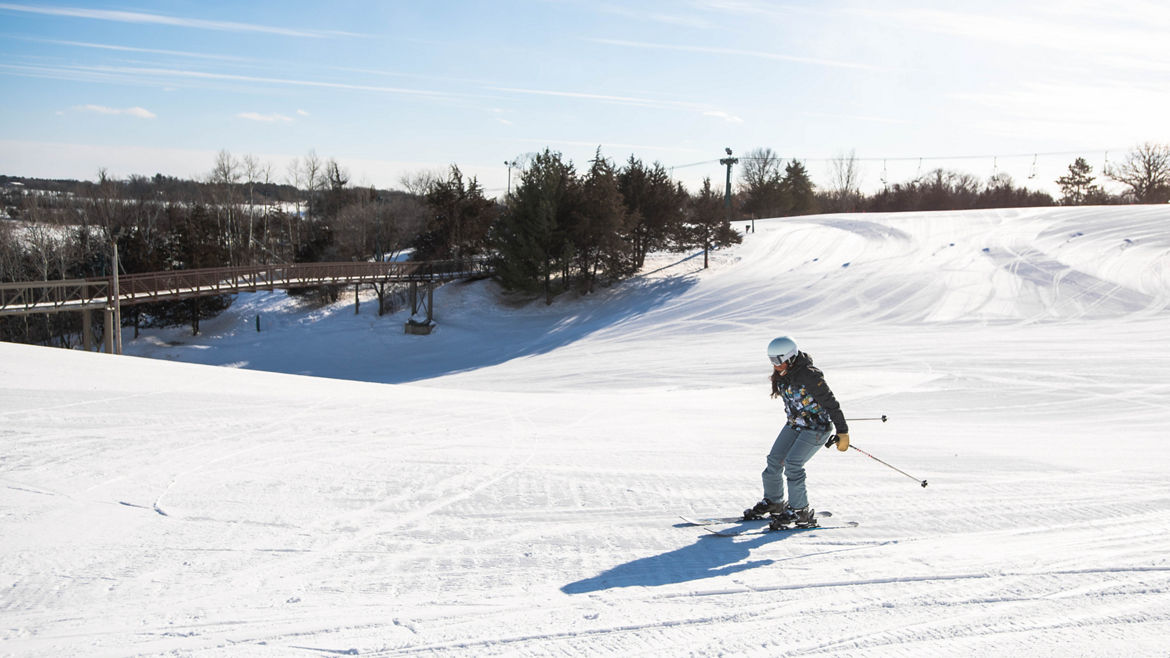 Afton Alps in USA - a person riding skis down a snowy slope.