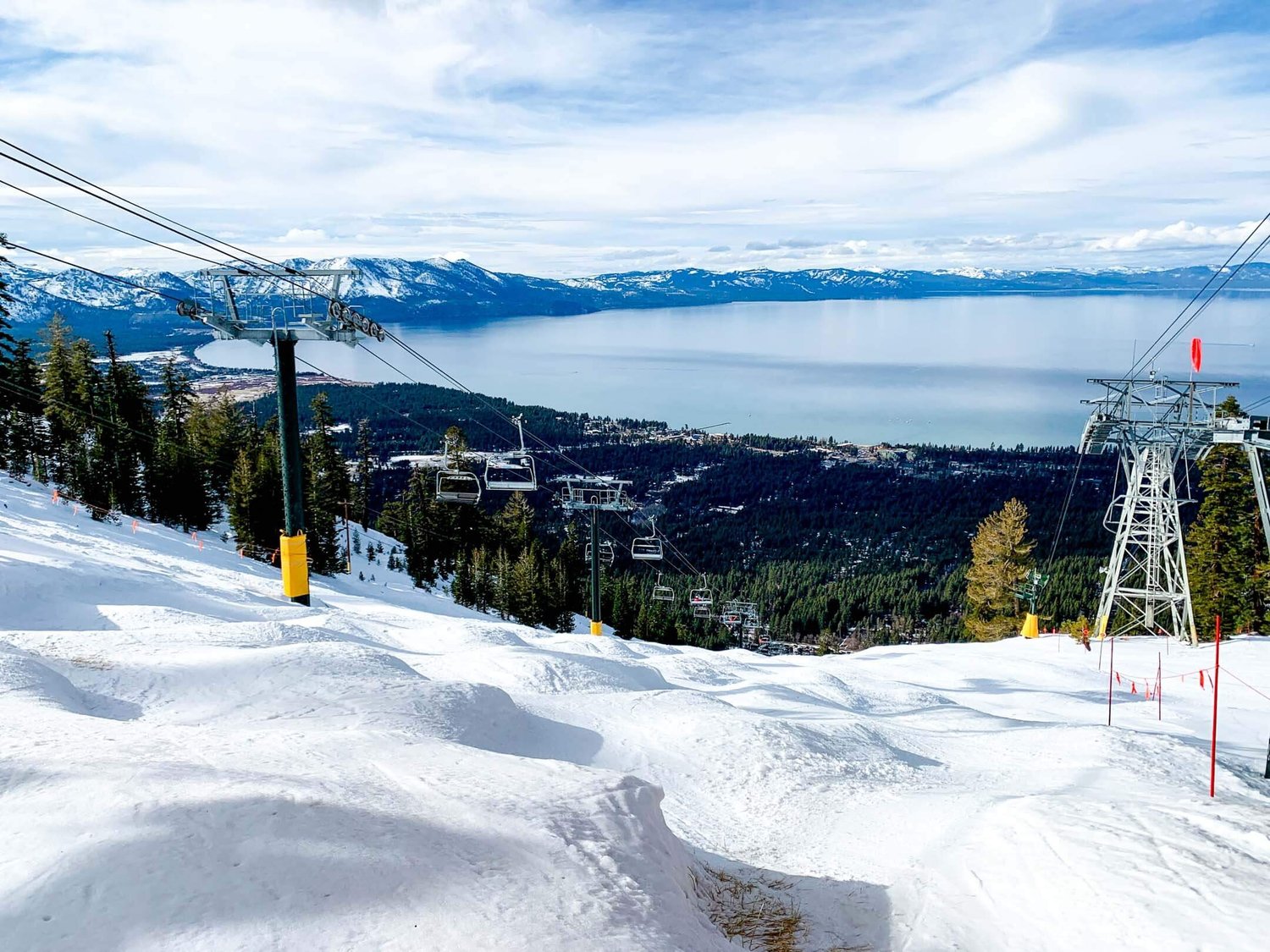 Heavenly in USA - a ski lift going down a snowy slope.