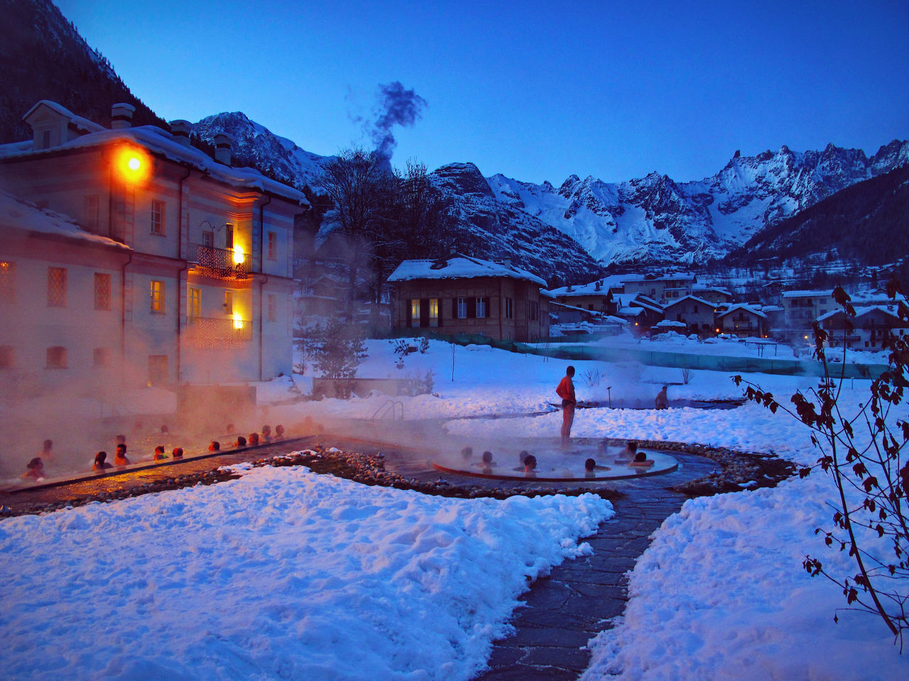Lurisia Monte Pigna in Italy - a hot pool in the middle of a snowy landscape.