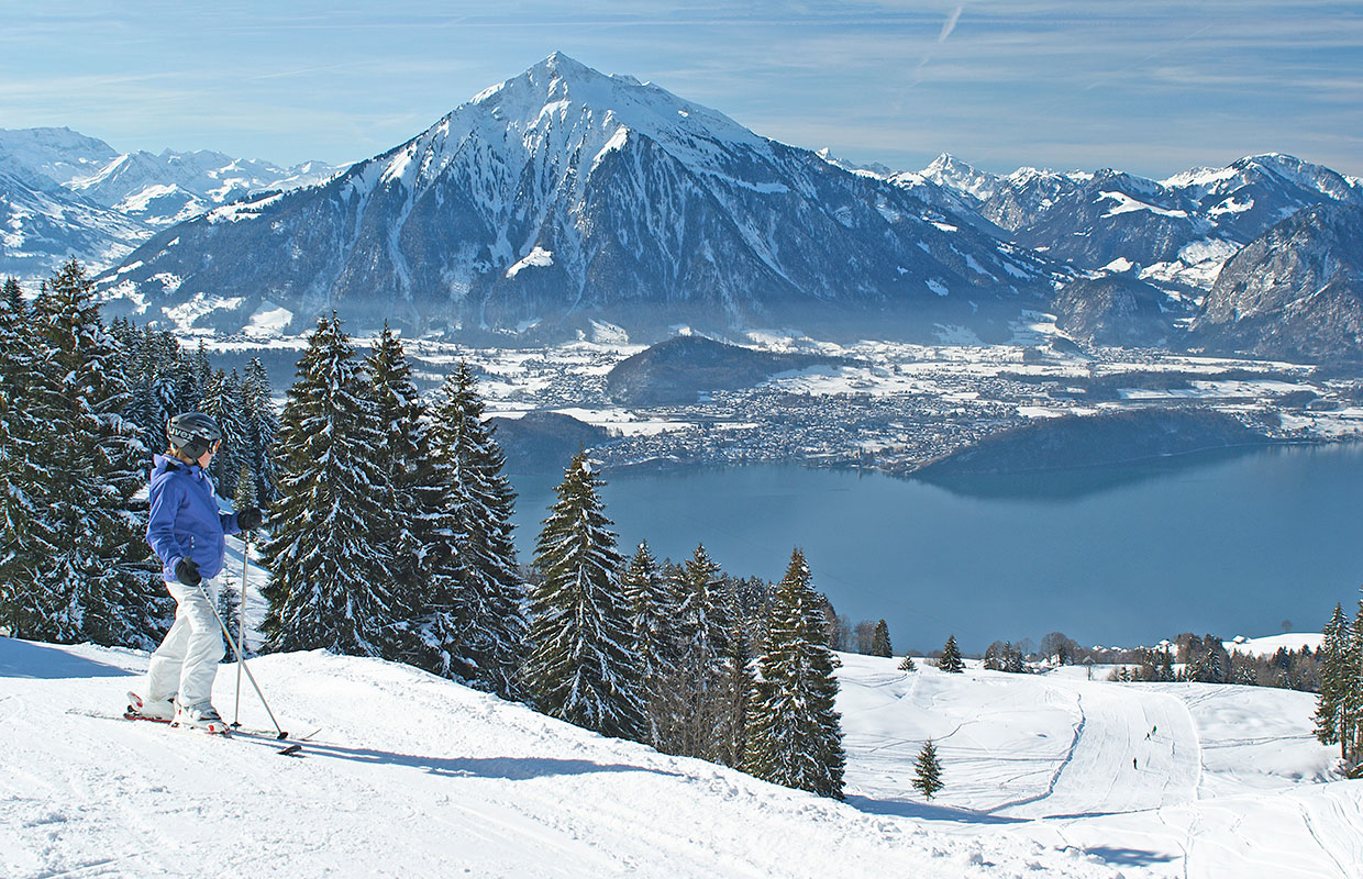 Schwanden - Sigriswil in Switzerland - a person on skis on a snowy slope.