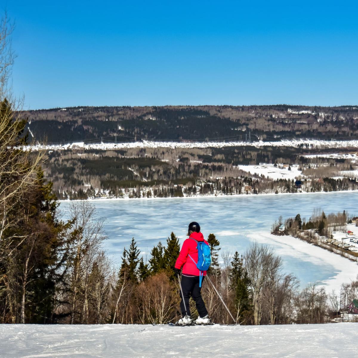 Mont-Saint-Mathieu in Canada - a person standing on top of a snow covered hill.