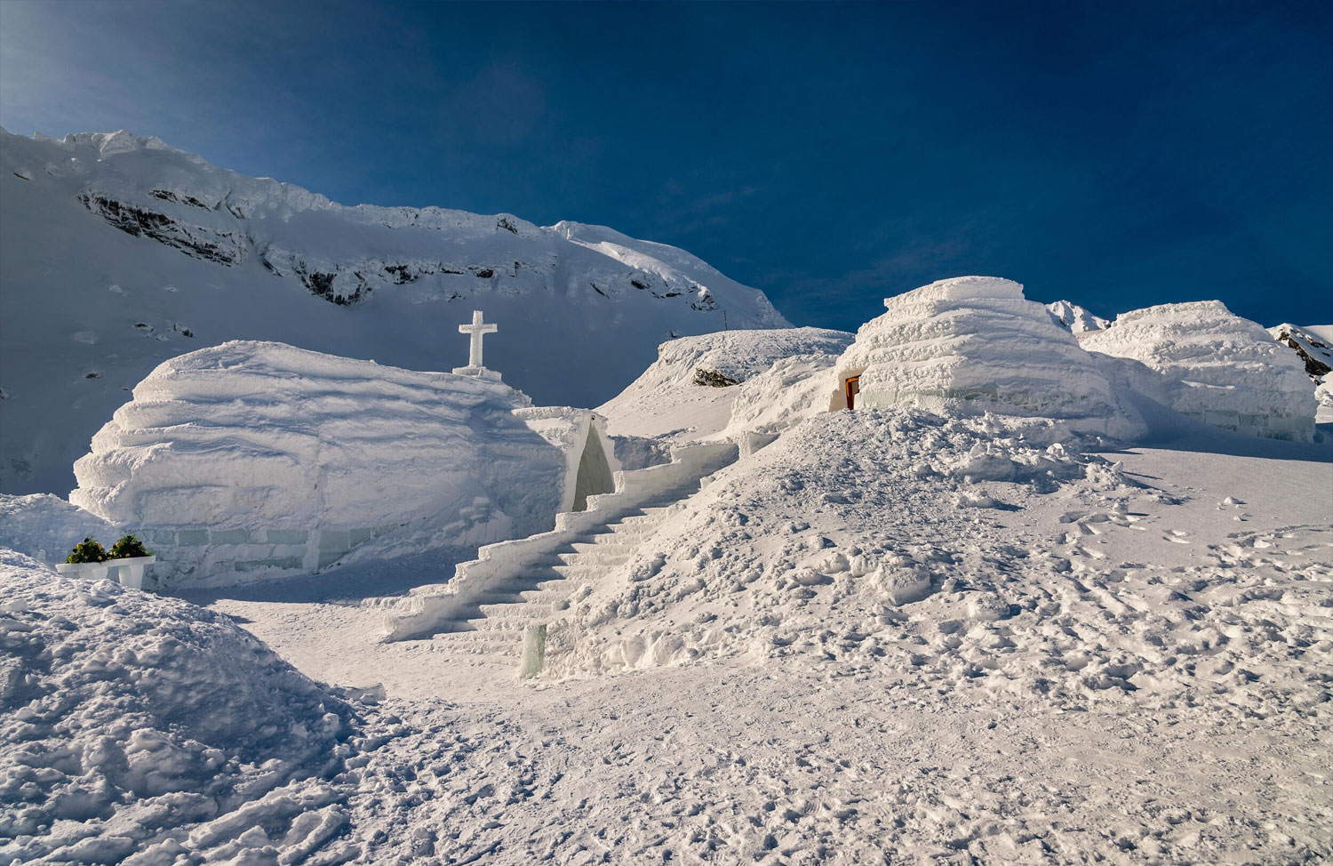 Balea Lac resort in Romania - a person on a snowboard in the snow.