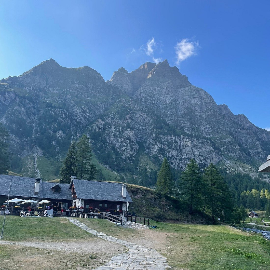Alpe Devero – Baceno in Italy - a small village with a mountain in the background.