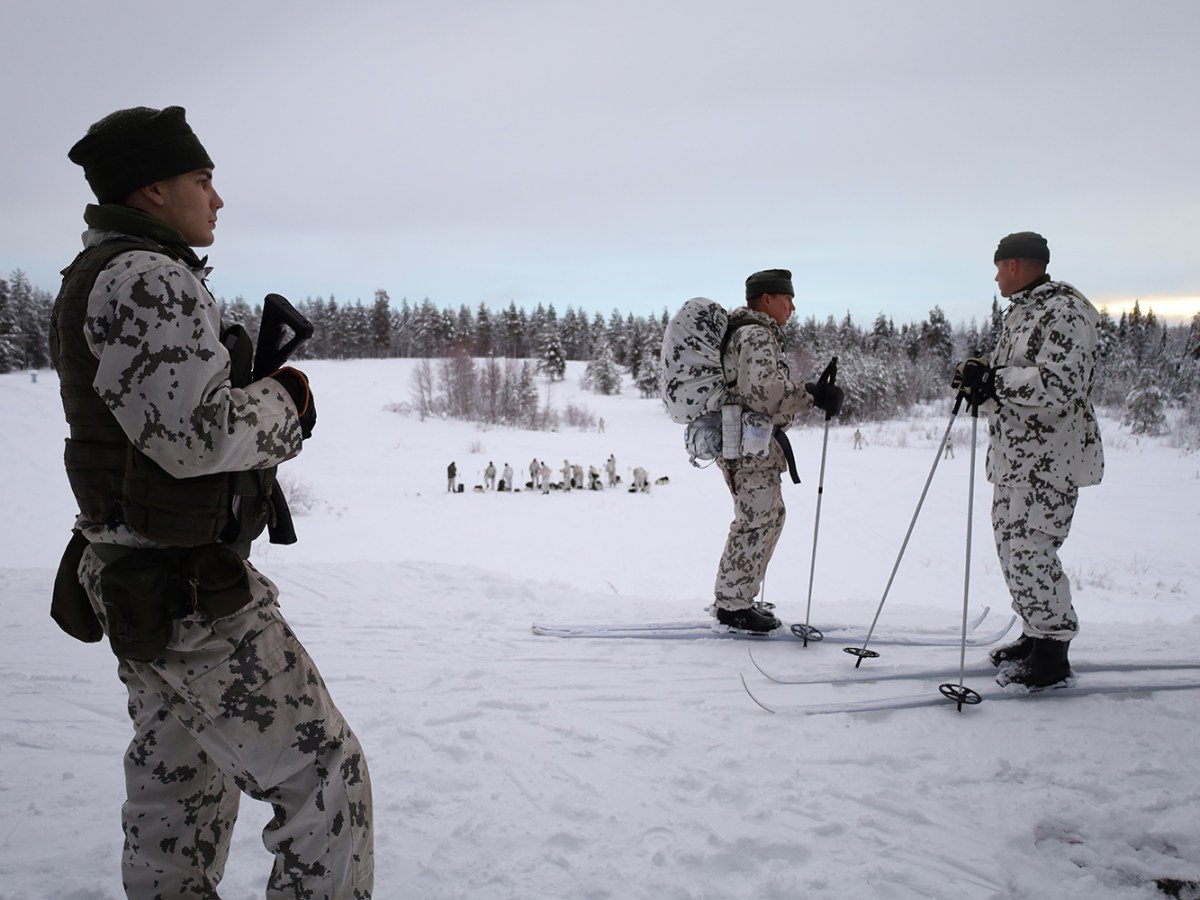 Play in Ukraine - a group of people on skis in the snow.