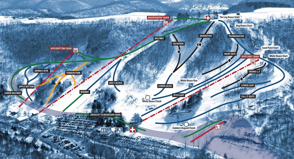 Ski resort at Mt. La Crosse, Wisconsin, showcasing a ski lift and chalet amidst a lively winter sports scene.