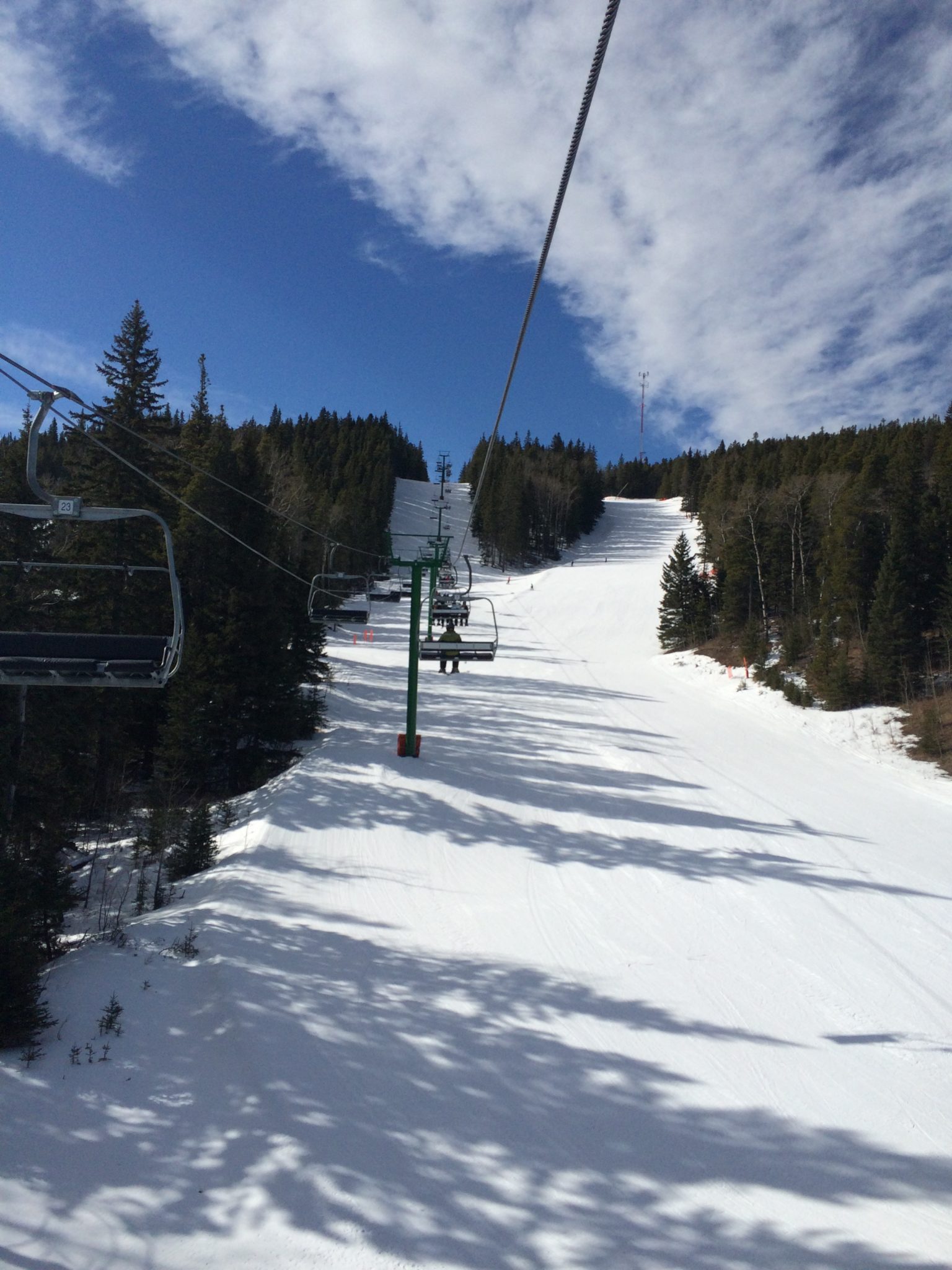 Hidden Valley in Canada - a ski lift going down a snowy slope.