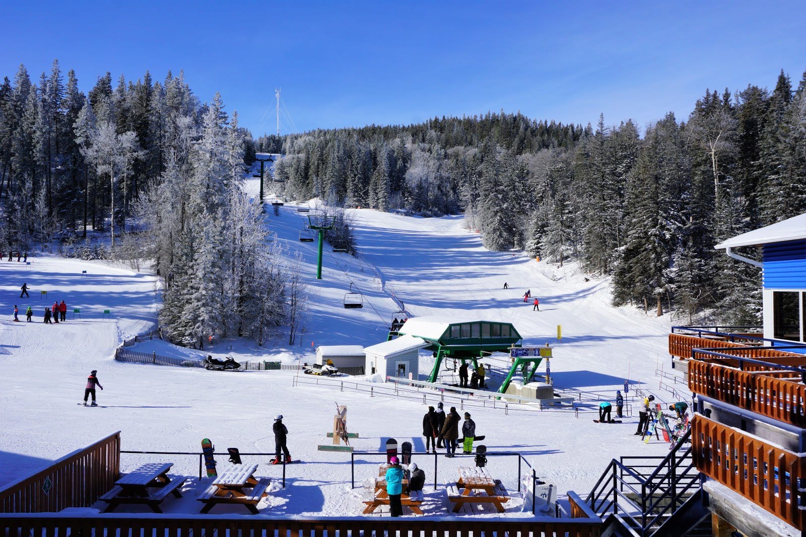 Hidden Valley in Canada - a view of a ski slope with people on it.