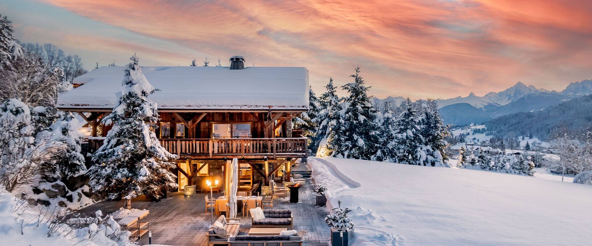Megève in France - a house in the mountains covered in snow.